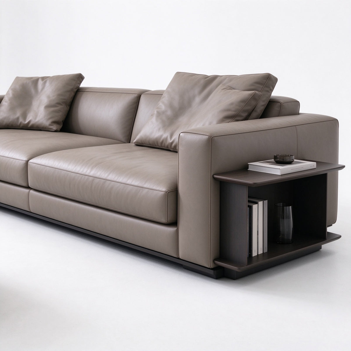 The sofa with an integrated side table and open storage shelves beneath it
